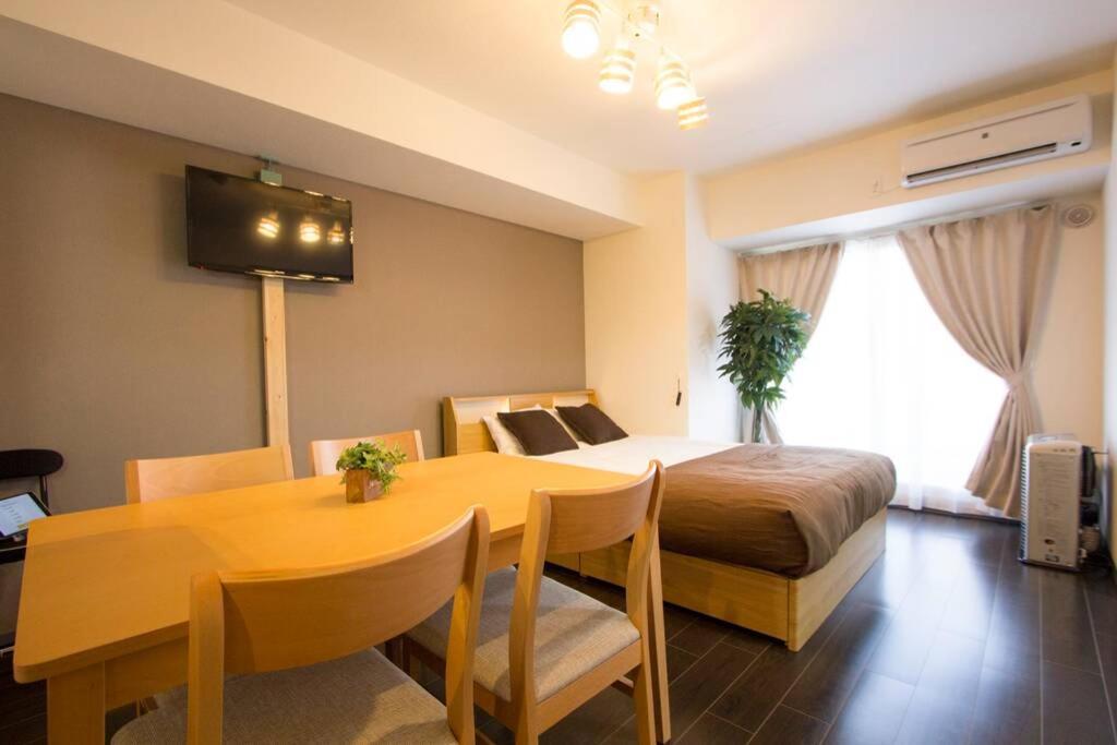 ようこそ札幌へ! 大通公園まで地下鉄10分 定員6名 Firetv完備 1階はセコマ Apartamento Exterior foto